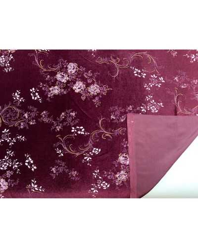 Tissu velours bi-élastique brillant imprimé fleurs dévorées 150 cm de haut
