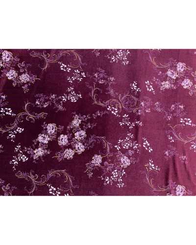 Tissu velours bi-élastique brillant imprimé fleurs dévorées 150 cm de haut