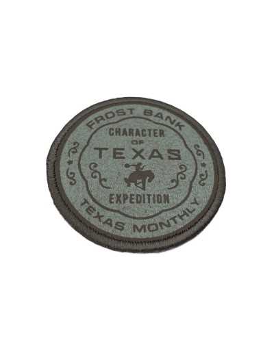 Thermoadhäsive Anwendung, runder beigefarbener Patch mit Aufschrift „Texas“, 45 mm