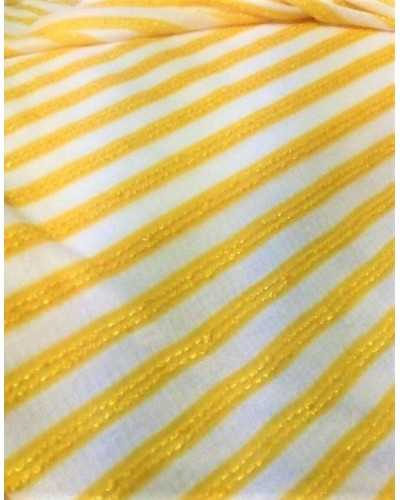 Tejido jersey de algodón y viscosa con rayas verticales en orillo y microlentejuelas de 150 cm de altura