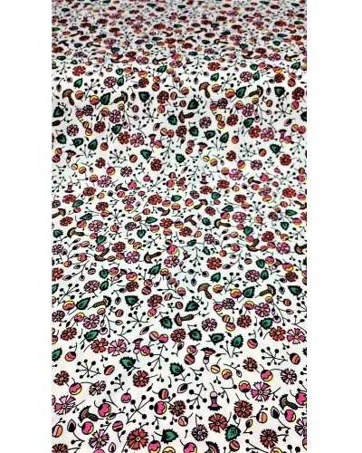 The fabric has elastic moulded micro-patterned small flowers bottom white high 150 cm