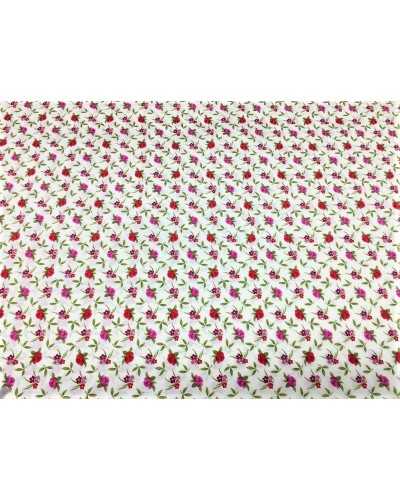 Coordinated printed cotton blend loneta upholstery fabric with little flowers and fuchsia and red stripes on a milky white backg