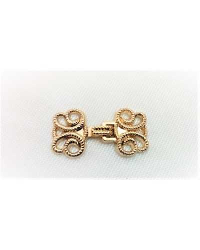 Gancho moleteado de metal con incrustaciones para chaqueta 30x15 mm