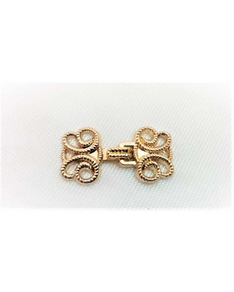 Gancho moleteado de metal con incrustaciones para chaqueta 30x15 mm