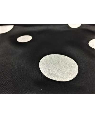 Carnival satin fabric printed black with large and small silver polka dots 150 cm high