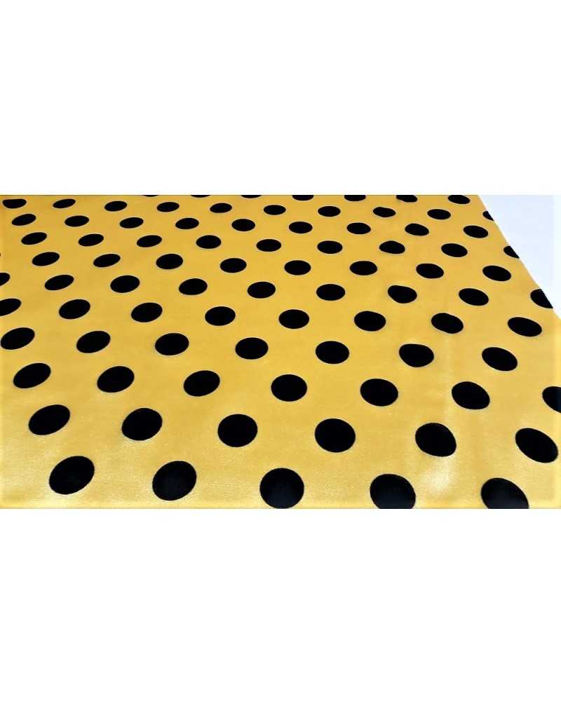 Semi-elastic carnival fabric with black polka dot print, 150 cm high